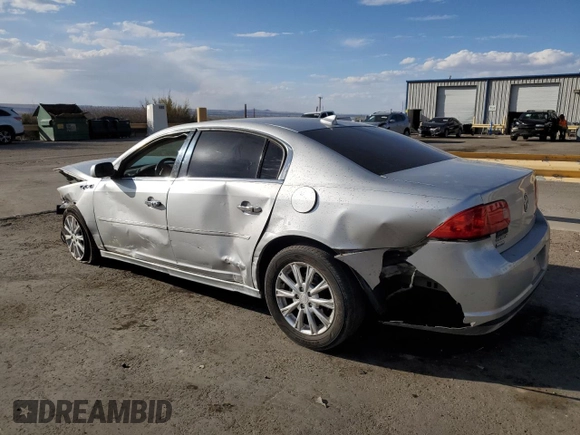 2011 Buick Lucerne CXL with VIN 1G4HC5EM7BU148074, listed as a Copart auction lot 50643555 with 127,734 mi miles and Salvage Title. Bid and sale history available at DreamBid. Image 2.