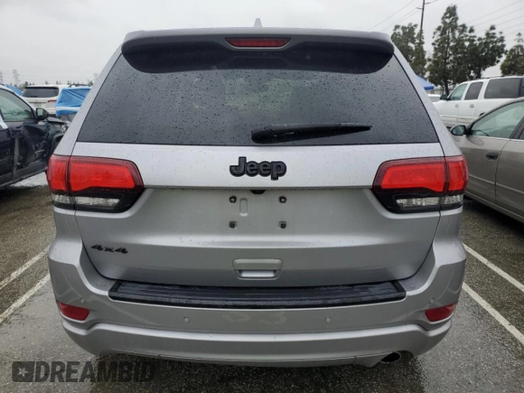2018 Jeep Grand Cherokee Laredo с VIN 1C4RJFAG8JC367974, выставлен на аукционе Copart как лот 48883405 с пробегом 99 311 миль миль и Списание • Salvage title. История ставок и продаж доступна на DreamBid. Изображение 6.