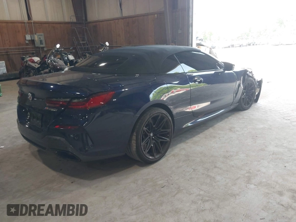 2023 BMW 8 Series with VIN WBAFY4C07PCM50546, listed as a IAAI auction lot 42403241 with 15,697 mi miles and . Bid and sale history available at DreamBid. Image 4.