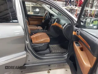2013 Jeep Grand Cherokee Overland with VIN 1C4RJFCT9DC524605, listed as a IAAI auction lot 42016103 with 215,352 mi miles. Bid and sale history available at carsss.com. Image 5.