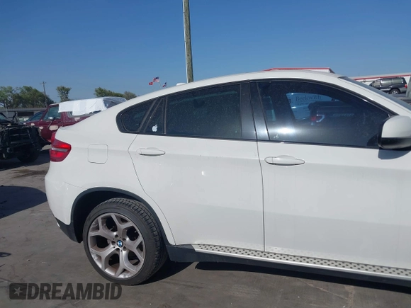 2014 BMW X6 xDrive35i z VIN 5UXFG2C5XE0C44062, wystawiony jako IAAI lot #41848304 z przebiegiem 154 683 mil mil oraz . Historia ofert i sprzedaży dostępna na DreamBid. Obrazek 14.
