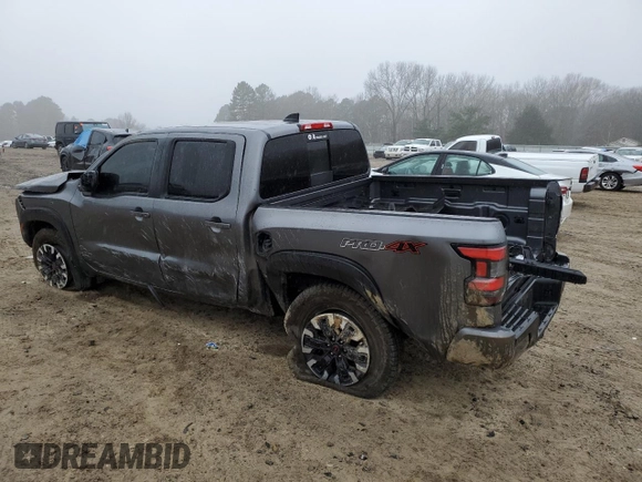 2024 Nissan Frontier Pro-4X with VIN 1N6ED1EK5RN627574, listed as a Copart auction lot 43977725 with 12,019 mi miles and Salvage title. Bid and sale history available at DreamBid. Image 2.