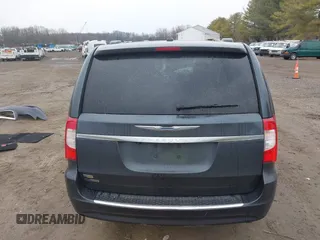 2014 Chrysler Town & Country Touring with VIN 2C4RC1BG6ER348090, listed as a IAAI auction lot 41687678 with 140,192 mi miles. Bid and sale history available at carsss.com. Image 16.