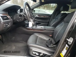 2016 BMW 7 Series 750i with VIN WBA7F0C5XGGL99017, listed as a Copart auction lot 84934504 with 0 mi miles and Salvage Title. Bid and sale history available at carsss.com. Image 7.