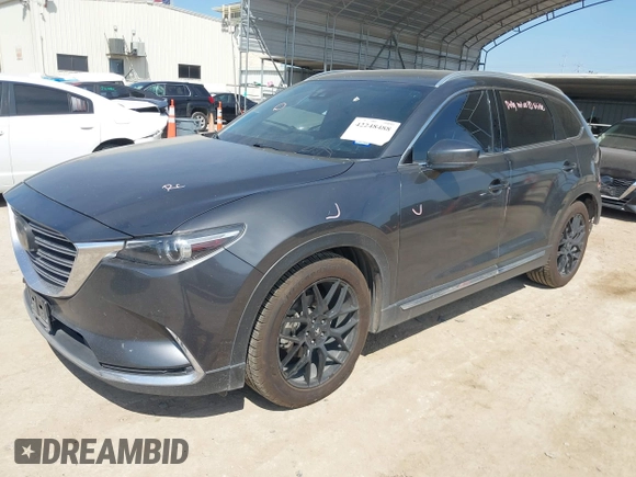 2016 Mazda CX-9 Grand Touring with VIN JM3TCADY5G0120033, listed as a IAAI auction lot 42248488 with 150,044 mi miles and . Bid and sale history available at DreamBid. Image 18.