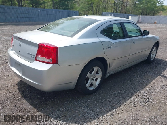 2010 Dodge Charger SXT with VIN 2B3CA3CV8AH277058, listed as a IAAI auction lot 42179056 with 162,971 mi miles. Bid and sale history available at carsss.com. Image 4.