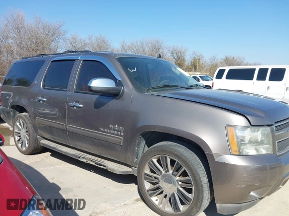2011 Chevrolet Suburban LT with VIN 1GNSCJE03BR381301, listed as a IAAI auction lot 41412636 with 243,601 mi miles. Bid and sale history available at carsss.com. Image 19.