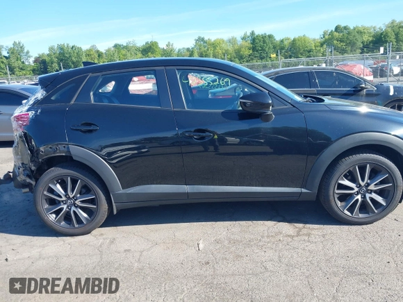 2018 Mazda CX-3 Touring z VIN JM1DKFC73J0321605, wystawiony jako IAAI lot #42355269 z przebiegiem 40 053 mil mil oraz . Historia ofert i sprzedaży dostępna na DreamBid. Obrazek 13.