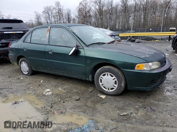 1998 Mitsubishi Mirage DE z VIN JA3AY26A2WU042095, wystawiony jako Copart lot #84700394 z przebiegiem 124 362 mil mil oraz Czysty tytuł • Clean title. Historia ofert i sprzedaży dostępna na DreamBid. Obrazek 4.