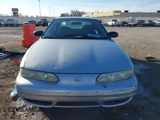 2004 Oldsmobile Alero GL1 z VIN 1G3NL52E94C189058, wystawiony jako IAAI lot #41224615 z przebiegiem 208 921 mil mil oraz . Historia ofert i sprzedaży dostępna na DreamBid. Obrazek 12.