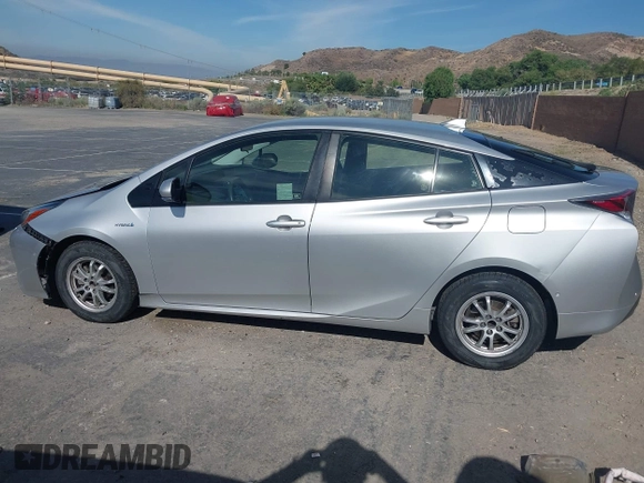 2017 Toyota Prius Two with VIN JTDKBRFU8H3048082, listed as a IAAI auction lot 42496637 with 104,302 mi miles and . Bid and sale history available at DreamBid. Image 14.