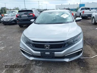 2020 Honda Civic LX with VIN 2HGFC2F65LH544133, listed as a IAAI auction lot 42148441 with 49,063 mi miles and . Bid and sale history available at DreamBid. Image 12.