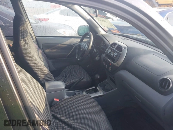 2003 Toyota RAV4 with VIN JTEGH20V930104839, listed as a IAAI auction lot 41944209 with 228,572 mi miles. Bid and sale history available at carsss.com. Image 5.