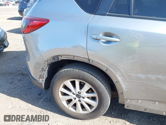 2014 Mazda CX-5 Touring with VIN JM3KE4CY0E0302583, listed as a IAAI auction lot 41947735 with 122,077 mi miles. Bid and sale history available at carsss.com. Image 19.