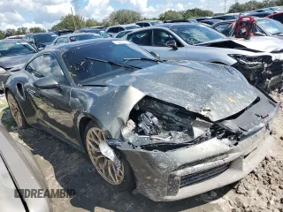2023 Porsche 911 Turbo with VIN WP0AD2A99PS258016, listed as a Copart auction lot 72852814 with 7,386 mi miles and Salvage Title. Bid and sale history available at carsss.com. Image 4.