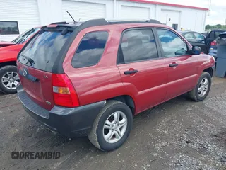 2006 Kia Sportage LX with VIN KNDJF723567236257, listed as a IAAI auction lot 42241914 with 185,503 mi miles and . Bid and sale history available at DreamBid. Image 4.