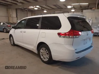 2011 Toyota Sienna XLE AAS with VIN 5TDYK3DC5BS130066, listed as a IAAI auction lot 41294340 with 156,591 mi miles and . Bid and sale history available at DreamBid. Image 3.