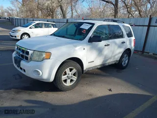 2008 Ford Escape Hybrid with VIN 1FMCU59H58KD75563, listed as a IAAI auction lot 41939067 with 127,609 mi miles. Bid and sale history available at carsss.com. Image 2.