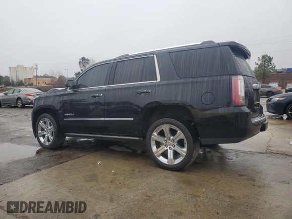 2018 GMC Yukon Denali with VIN 1GKS1CKJ5JR152838, listed as a Copart auction lot 44698935 with 123,807 mi miles and Salvage Title. Bid and sale history available at carsss.com. Image 2.