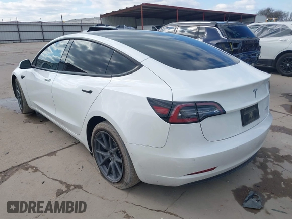 2021 Tesla Model 3 Long Range with VIN 5YJ3E1EB9MF059554, listed as a IAAI auction lot 41231520 with 63,696 mi miles and . Bid and sale history available at DreamBid. Image 3.