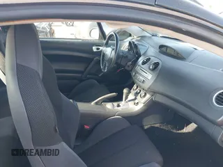 2008 Mitsubishi Eclipse GS z VIN 4A3AK24F78E007791, wystawiony jako IAAI lot #42094818 z przebiegiem 187 921 mil mil oraz . Historia ofert i sprzedaży dostępna na DreamBid. Obrazek 5.