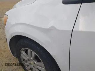 2014 Chevrolet Sonic LT with VIN 1G1JC5SH2E4162166, listed as a IAAI auction lot 42105408 with 122,854 mi miles and . Bid and sale history available at DreamBid. Image 6.