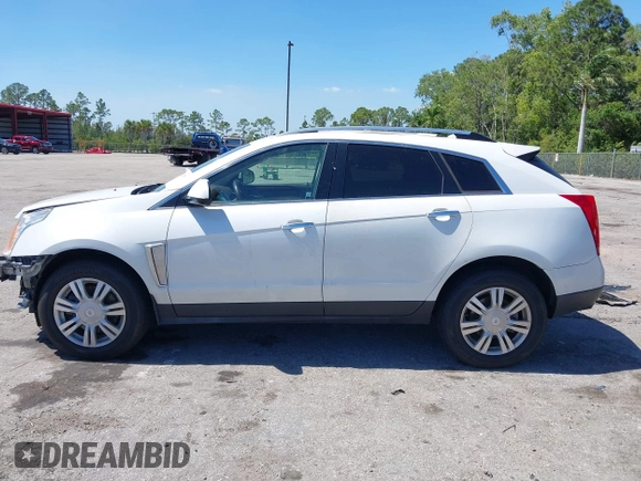 2016 Cadillac SRX Luxury Collection z VIN 3GYFNEE34GS513728, wystawiony jako IAAI lot #41847871 z przebiegiem 109 045 mil mil oraz . Historia ofert i sprzedaży dostępna na DreamBid. Obrazek 14.