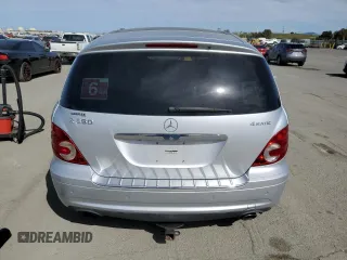 2009 Mercedes-Benz R 3.5L with VIN 4JGCB65E79A091057, listed as a Copart auction lot 52186915 with 99,173 mi miles and Salvage Title. Bid and sale history available at DreamBid. Image 6.