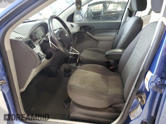 2005 Ford Focus SE with VIN 1FAHP36N65W187161, listed as a Copart auction lot 52024045 with 261,194 mi miles and Salvage Title. Bid and sale history available at carsss.com. Image 7.