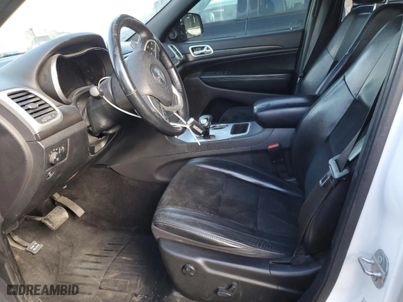 2015 Jeep Grand Cherokee Altitude with VIN 1C4RJFAG4FC954941, listed as a Copart auction lot 42010465 with 125,311 mi miles and Salvage Title. Bid and sale history available at carsss.com. Image 7.