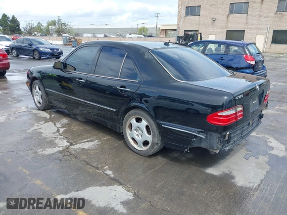 2000 Mercedes-Benz E-Class with VIN WDBJF65JXYA997410, listed as a IAAI auction lot 41939485 with 158,559 mi miles. Bid and sale history available at carsss.com. Image 3.