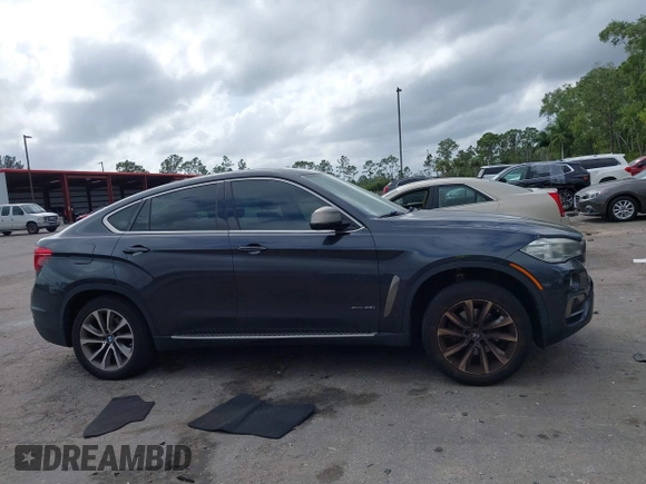 2015 BMW X6 xDrive35i z VIN 5UXKU2C59F0N76242, wystawiony jako IAAI lot #41714644 z przebiegiem 170 851 mil mil oraz . Historia ofert i sprzedaży dostępna na DreamBid. Obrazek 13.