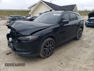 2018 Mazda CX-5 Grand Touring with VIN JM3KFBDM0J0327927, listed as a Copart auction lot 51800825 with 203,126 mi miles and Clean Title. Bid and sale history available at carsss.com. Image 1.
