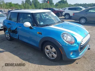 2015 MINI Hardtop 4 Door with VIN WMWXS5C51FT829693, listed as a IAAI auction lot 42497639 with 36,494 mi miles and . Bid and sale history available at DreamBid. Image 1.