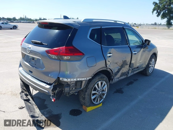 2017 Nissan Rogue SV with VIN KNMAT2MT9HP581822, listed as a IAAI auction lot 42140794 with 74,261 mi miles. Bid and sale history available at carsss.com. Image 4.