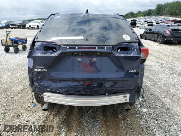 2022 Toyota RAV4 XLE Premium with VIN JTMC1RFV7ND087414, listed as a Copart auction lot 60844905 with 90,232 mi miles and Salvage title. Bid and sale history available at DreamBid. Image 6.