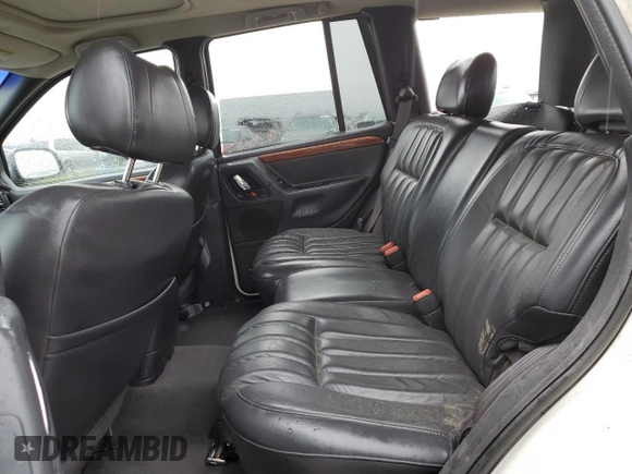 1999 Jeep Grand Cherokee Limited with VIN 1J4GW68N8XC707284, listed as a Copart auction lot 75548953 with 153,154 mi miles and Clean Title. Bid and sale history available at carsss.com. Image 11.