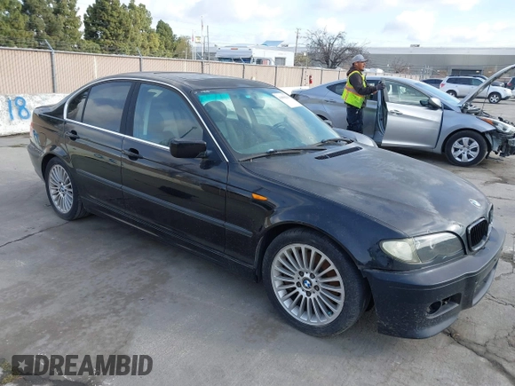 2003 BMW 3 Series 330i with VIN WBAEV534X3KM29039, listed as a IAAI auction lot 41850238 with 127,791 mi miles. Bid and sale history available at carsss.com. Image 1.