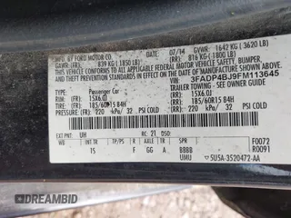 2015 Ford Fiesta SE with VIN 3FADP4BJ9FM113645, listed as a IAAI auction lot 41970671 with 138,026 mi miles. Bid and sale history available at carsss.com. Image 9.