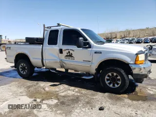 2001 Ford F-250 XL with VIN 1FTNX21F11ED05348, listed as a Copart auction lot 52098155 with 217,678 mi miles and Salvage Title. Bid and sale history available at DreamBid. Image 4.