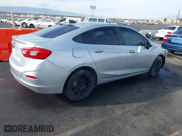 2018 Chevrolet Cruze LS with VIN 1G1BC5SM5J7182051, listed as a IAAI auction lot 41014751 with 112,749 mi miles and . Bid and sale history available at DreamBid. Image 4.