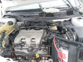 2003 Oldsmobile Alero GL1 z VIN 1G3NL52E03C256239, wystawiony jako IAAI lot #41949463 z przebiegiem 319 725 mil mil oraz . Historia ofert i sprzedaży dostępna na DreamBid. Obrazek 10.