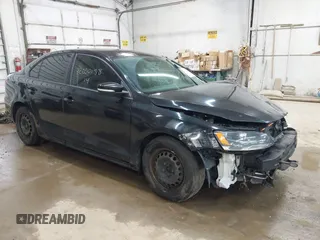 2014 Volkswagen Jetta SE z VIN 3VWD17AJ1EM274064, wystawiony jako IAAI lot #42200158 z przebiegiem 154 825 mil mil oraz . Historia ofert i sprzedaży dostępna na DreamBid. Obrazek 1.
