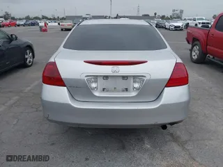 2007 Honda Accord Sdn VP with VIN JHMCM56117C017041, listed as a IAAI auction lot 42033947 with 231,586 mi miles. Bid and sale history available at carsss.com. Image 16.