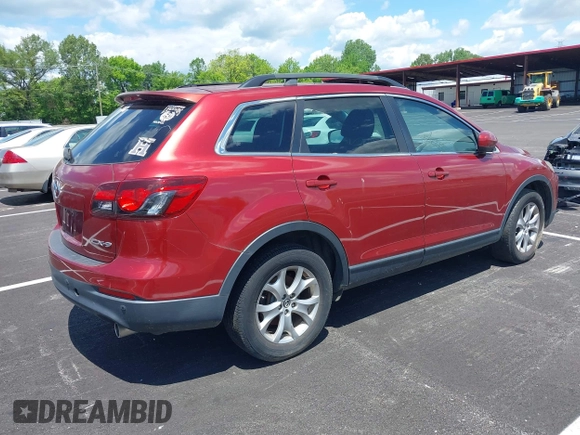 2014 Mazda CX-9 Touring with VIN JM3TB2CA7E0427214, listed as a IAAI auction lot 42175140 with 182,091 mi miles and . Bid and sale history available at carsss.com. Image 4.
