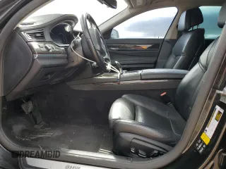 2015 BMW 7 Series 740Li xDrive with VIN WBAYF4C50FGS99289, listed as a Copart auction lot 79809474 with 128,993 mi miles and Salvage Title. Bid and sale history available at carsss.com. Image 7.
