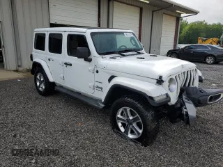 2020 Jeep Wrangler Unlimited Sahara with VIN 1C4HJXEG4LW272051, listed as a Copart auction lot 61090665 with 100,148 mi miles and Clean title. Bid and sale history available at DreamBid. Image 4.