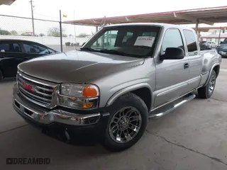 2003 GMC Sierra 1500 SLT with VIN 1GTEC19TX3Z212534, listed as a IAAI auction lot 41591390 with 158,457 mi miles. Bid and sale history available at carsss.com. Image 2.