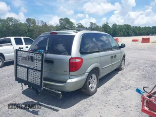 2003 Dodge Caravan SE with VIN 1D4GP25323B208661, listed as a IAAI auction lot 42766140 with 217,025 mi miles and . Bid and sale history available at DreamBid. Image 4.