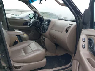 2002 Ford Escape XLT Choice with VIN 1FMYU03122KD02307, listed as a IAAI auction lot 41796242 with 1 mi miles. Bid and sale history available at carsss.com. Image 5.